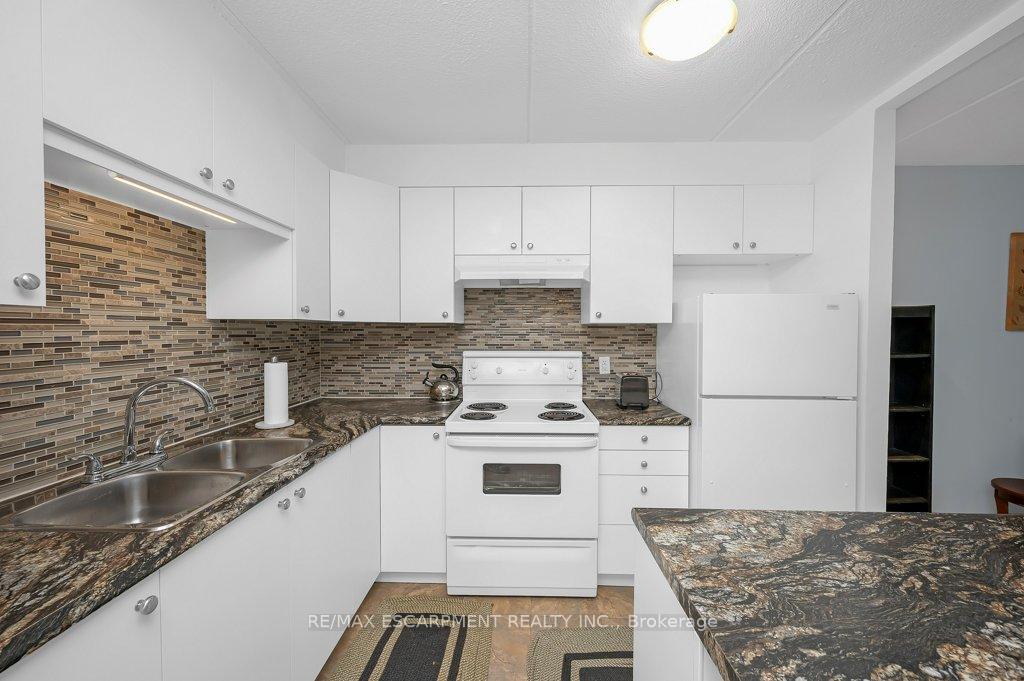 Photo 20 of Unit 402, 41 Rykert Street, St. Catharines, Western Hill — HOMEH