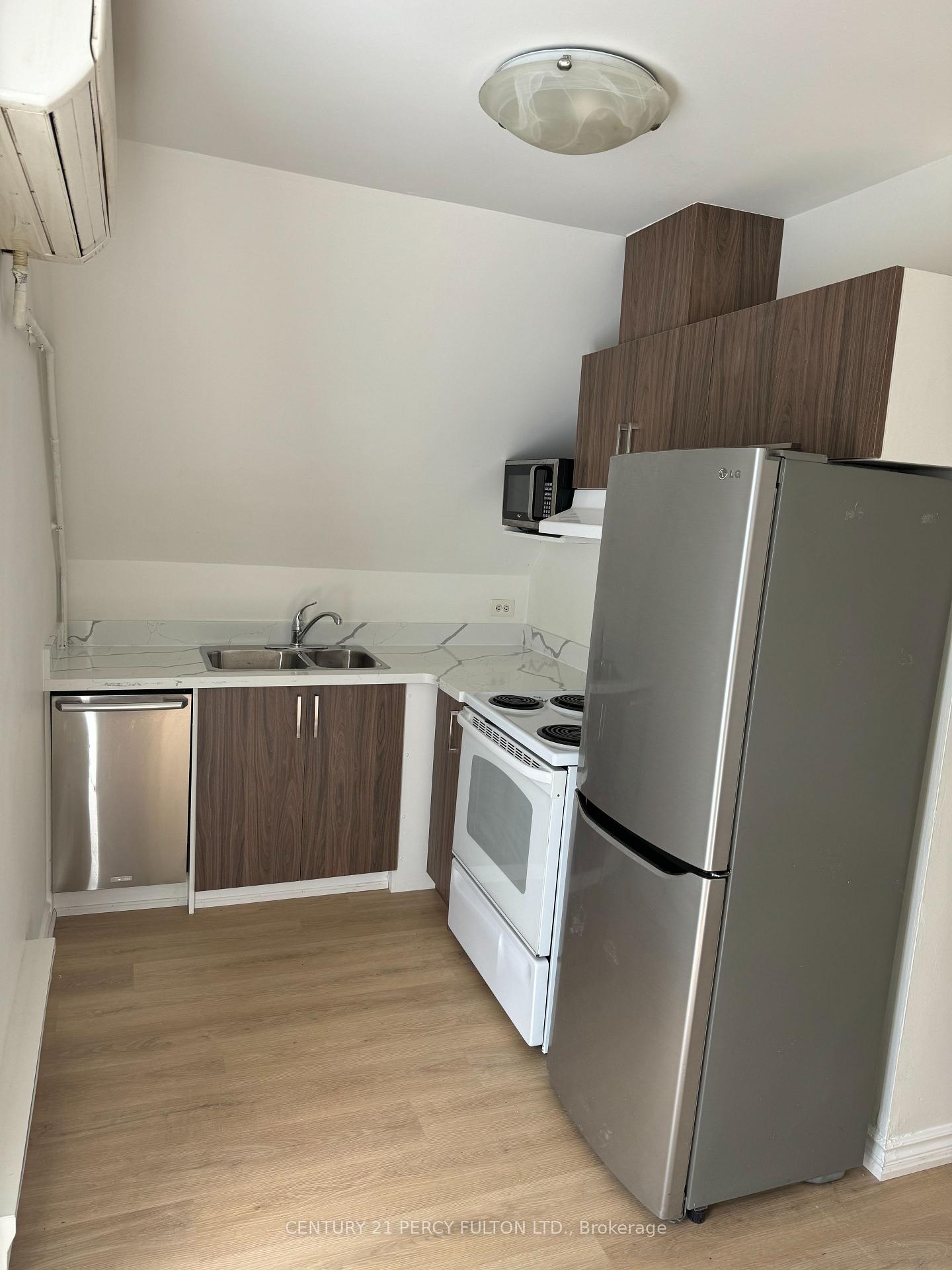 Photo 1 of Unit 6, 2527 Danforth Avenue, Toronto, East End-Danforth — HOMEH