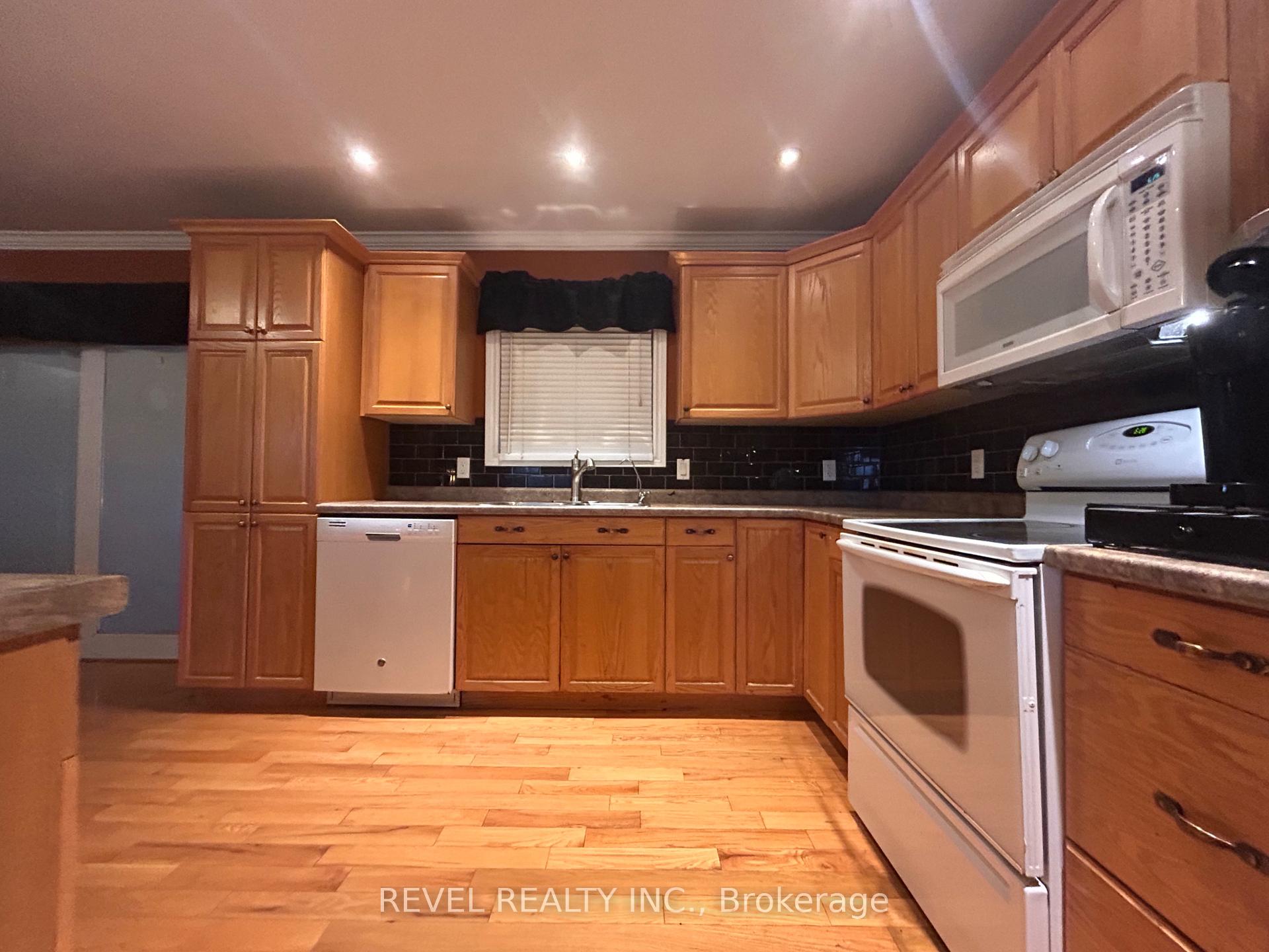 Photo 22 of 354 Seventeenth Avenue, Cochrane — HOMEH