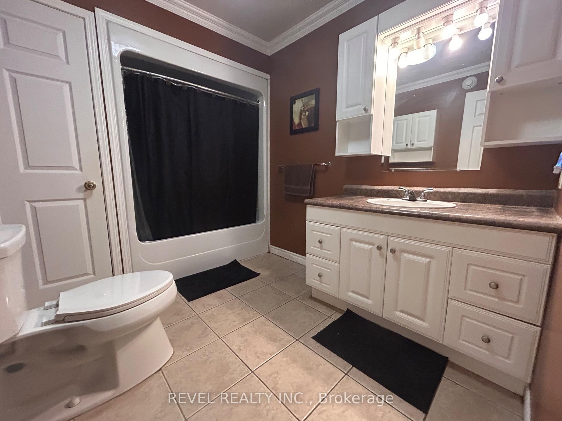 Photo 21 of 354 Seventeenth Avenue, Cochrane — HOMEH