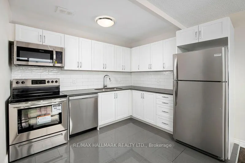Photo 2 of Unit 110, 3101 Eglinton Avenue E, Scarborough, Scarborough Village — HOMEH