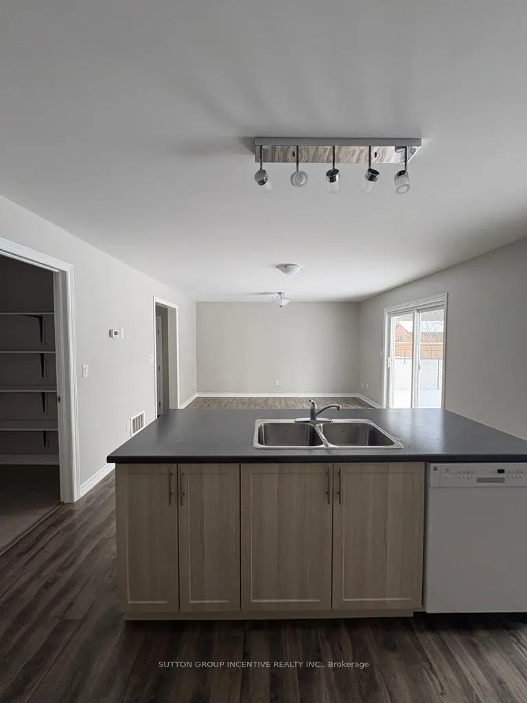 Photo 3 of Unit B, 1803 River Road, Wasaga Beach — HOMEH