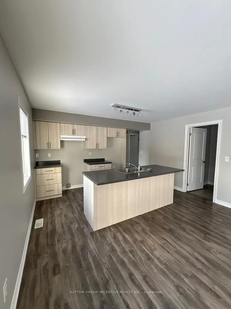 Photo 4 of Unit B, 1803 River Road, Wasaga Beach — HOMEH