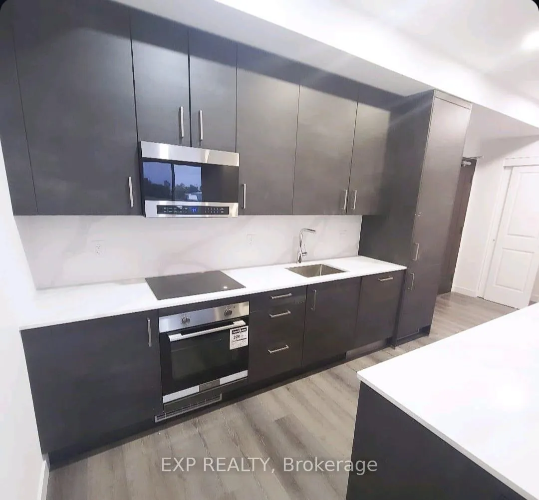 Photo 5 of Unit 308, 7549 Kalar Road, Niagara Falls, Brown — HOMEH