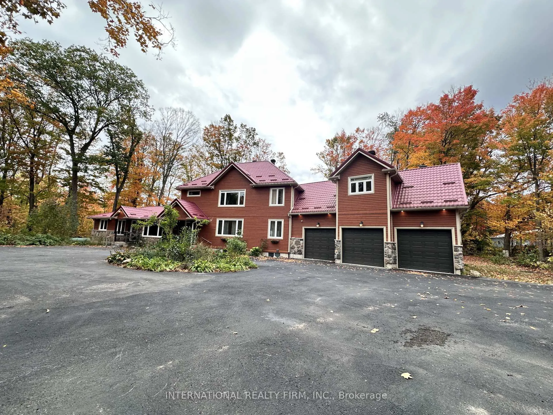 Front of 1075 Big Bay Point Road