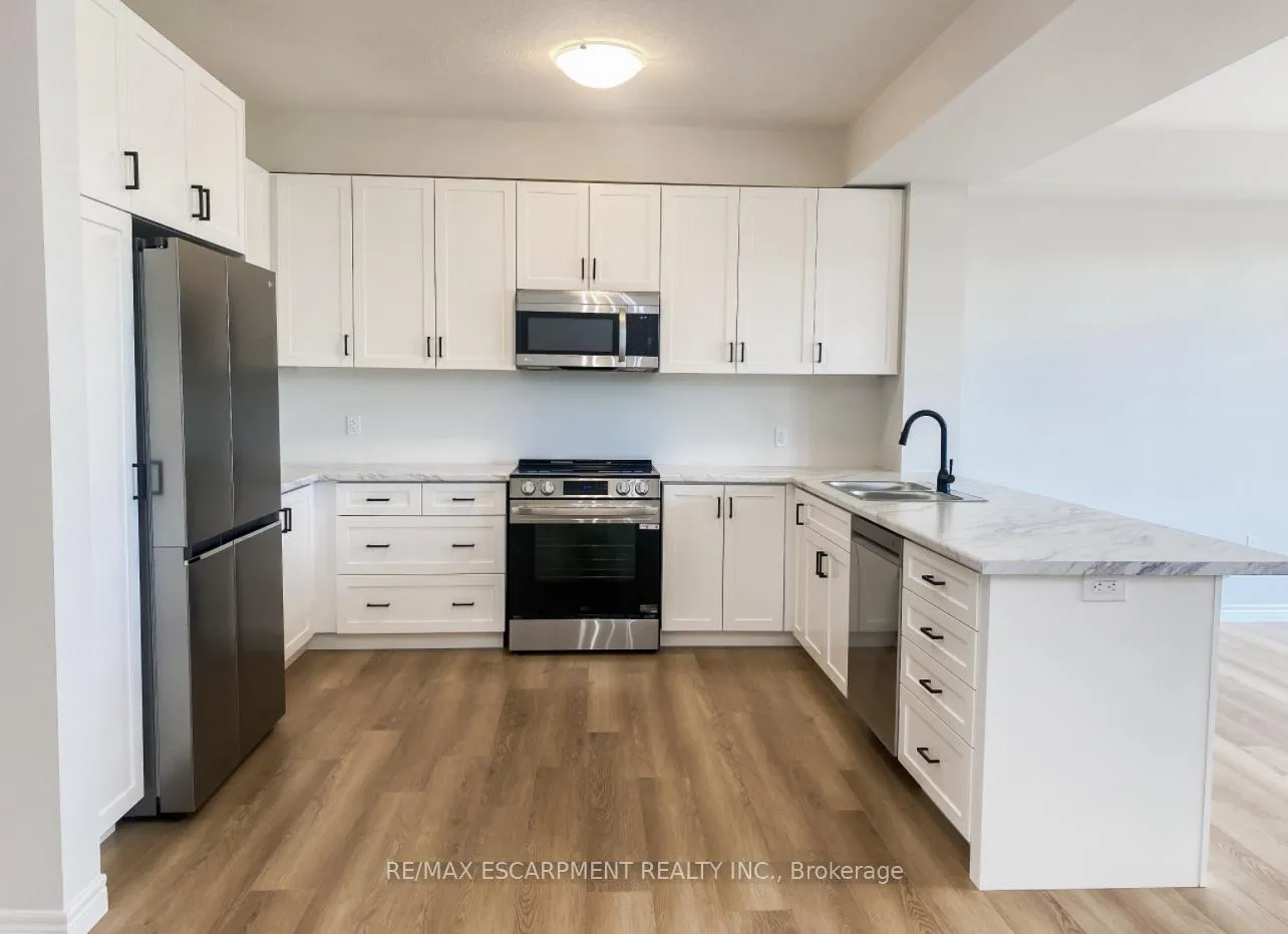 Photo 4 of 57 Lloyd Davies Way, Hamilton, Rural Glanbrook — HOMEH