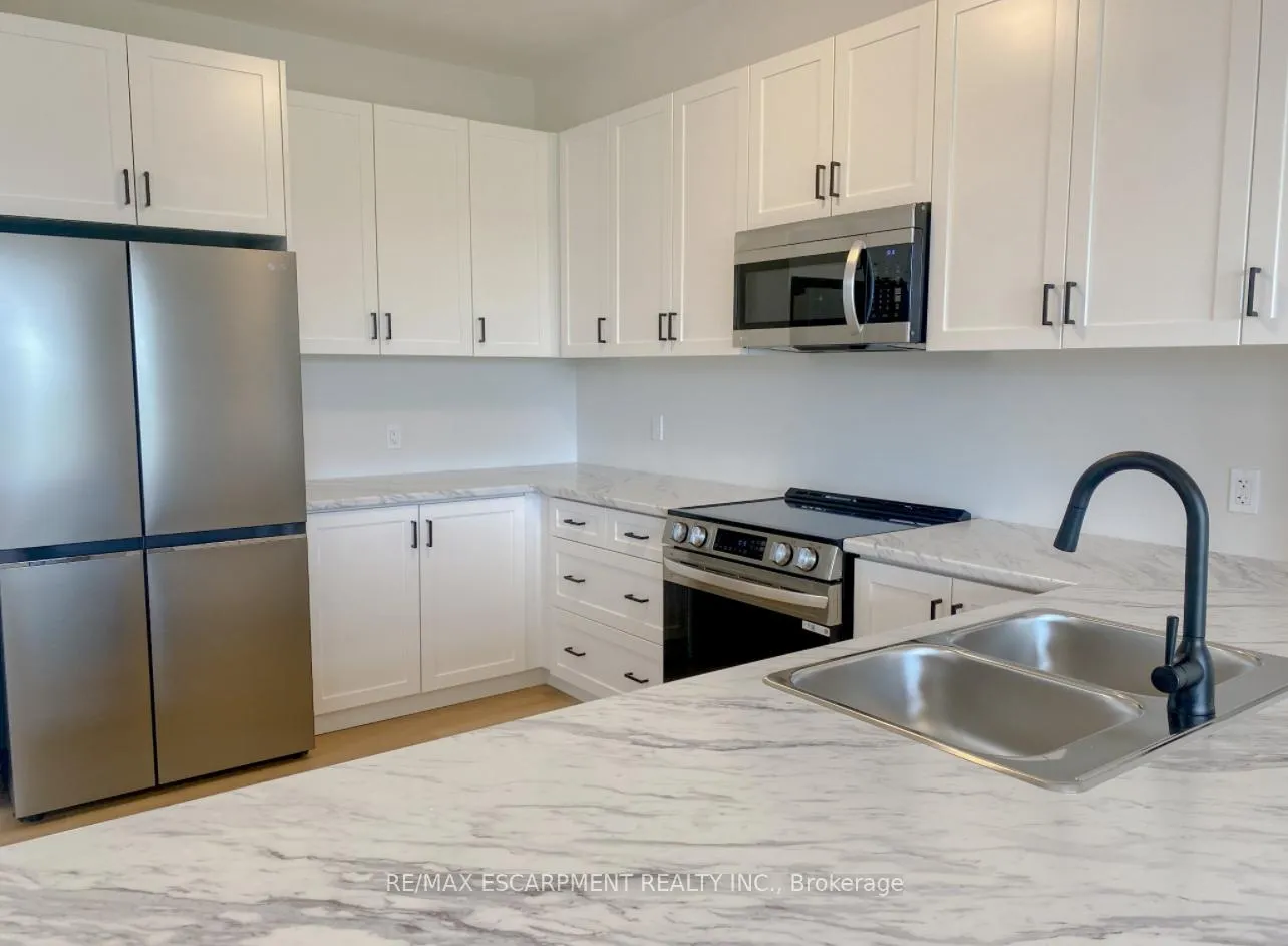 Photo 9 of 57 Lloyd Davies Way, Hamilton, Rural Glanbrook — HOMEH