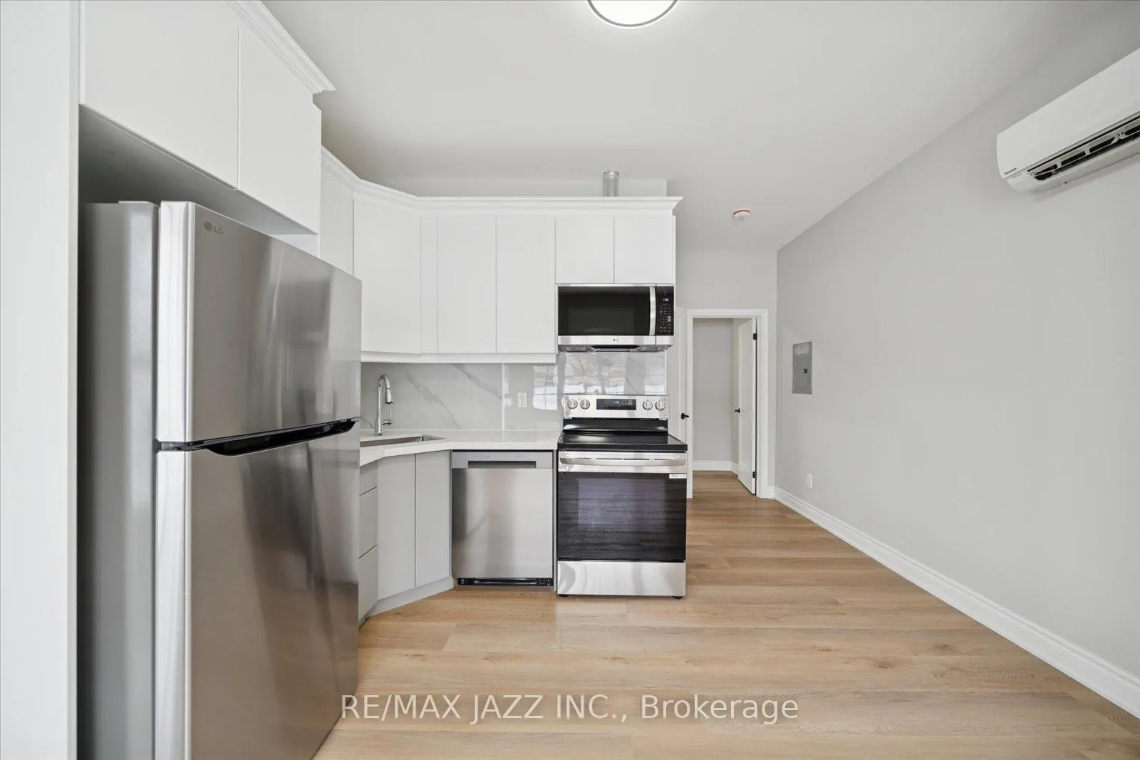 Photo 4 of Unit 102, 251 Simcoe Street S, Oshawa, Central — HOMEH