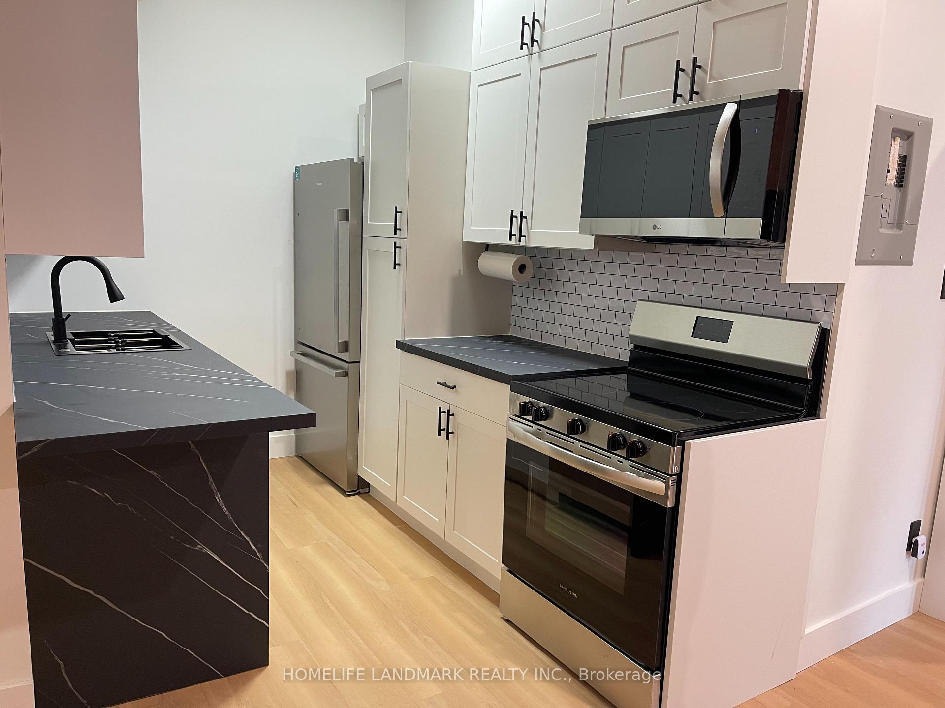 Photo 2 of Unit Bsmt B, 15415 Jane Street, King, Rural King — HOMEH