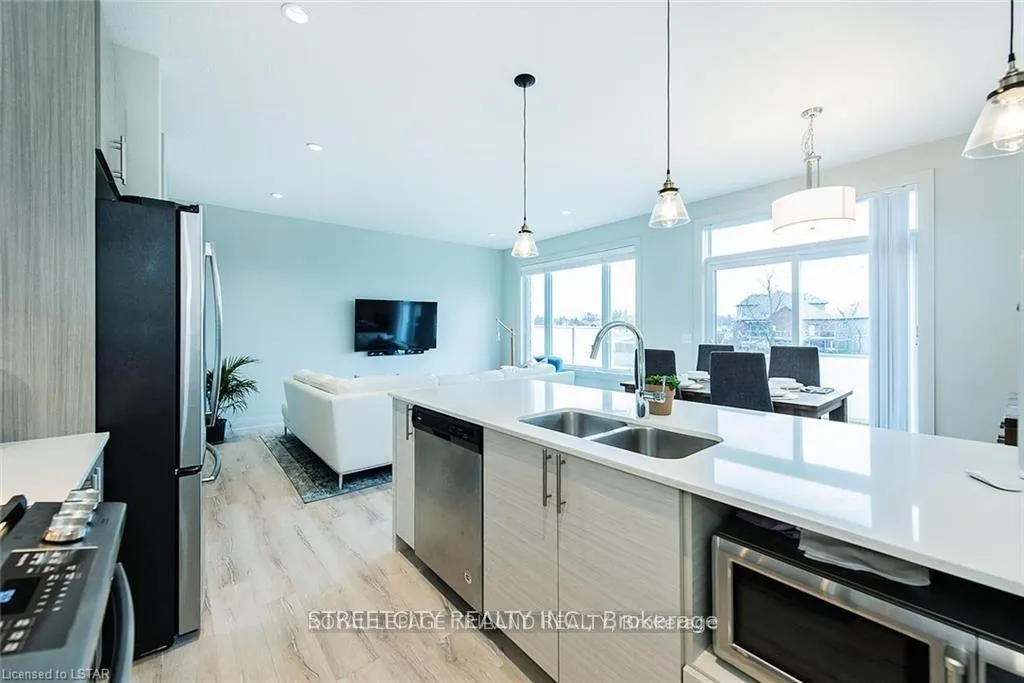 Photo 9 of Unit 100, 3025 Singleton Avenue W, London, South W — HOMEH