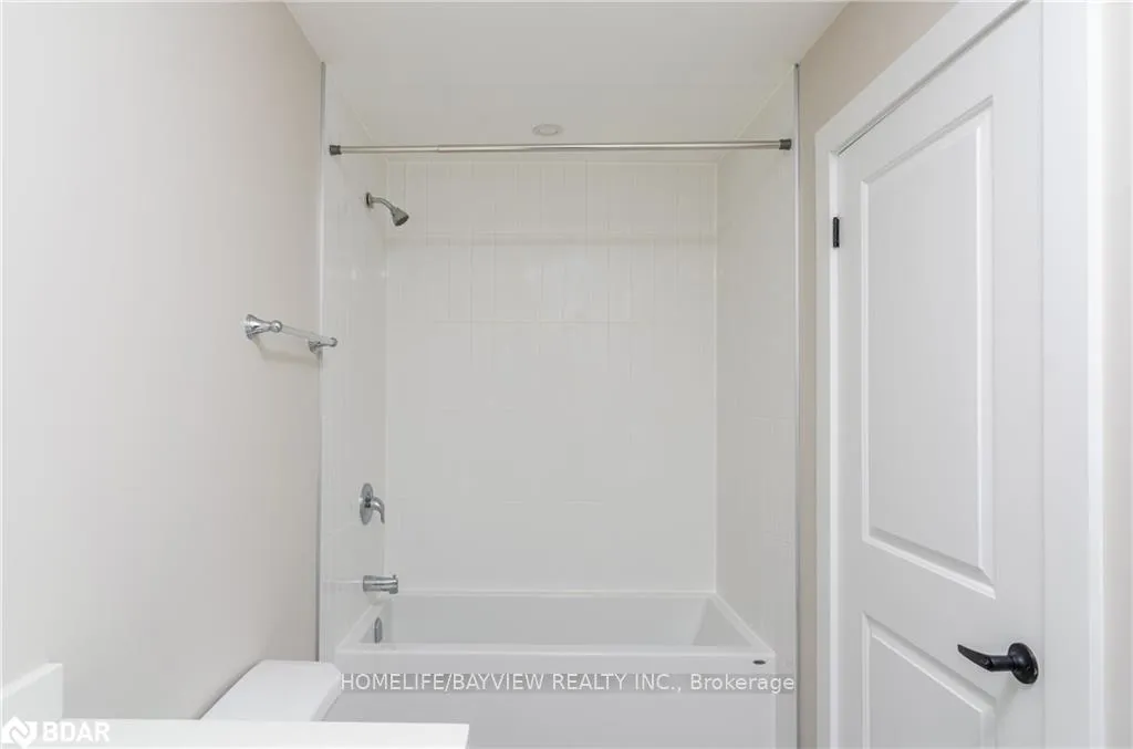 Photo 11 of Unit MAIN & 2nd, 164 Penetanguishene Road, Barrie, Grove East — HOMEH