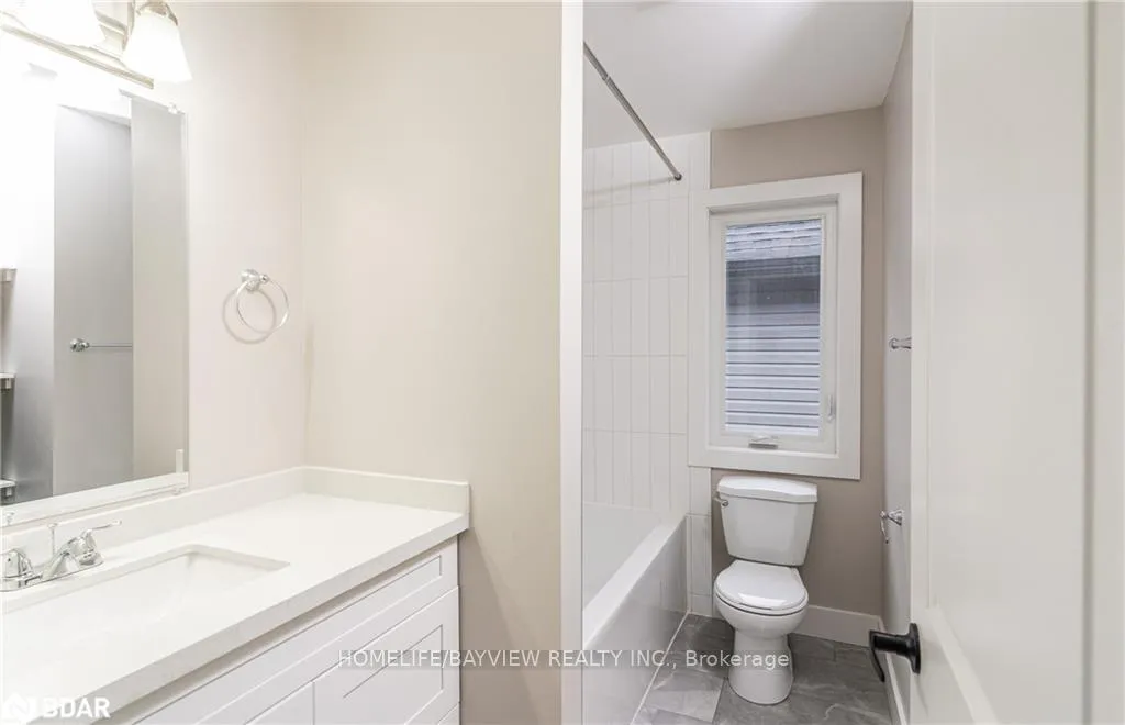 Photo 16 of Unit MAIN & 2nd, 164 Penetanguishene Road, Barrie, Grove East — HOMEH