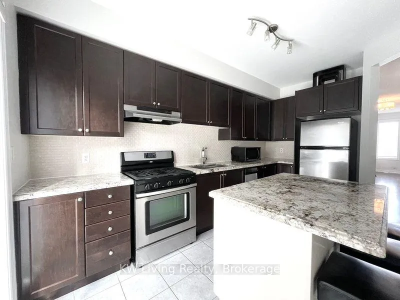 Photo 12 of 73 Enroutes Street, Toronto, East End-Danforth — HOMEH