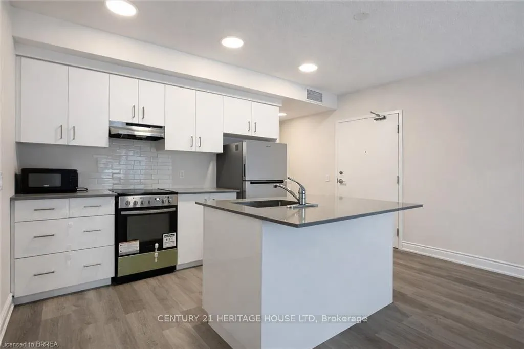 Photo 3 of Unit 103, 259 King Street E, Hamilton, Stoney Creek — HOMEH