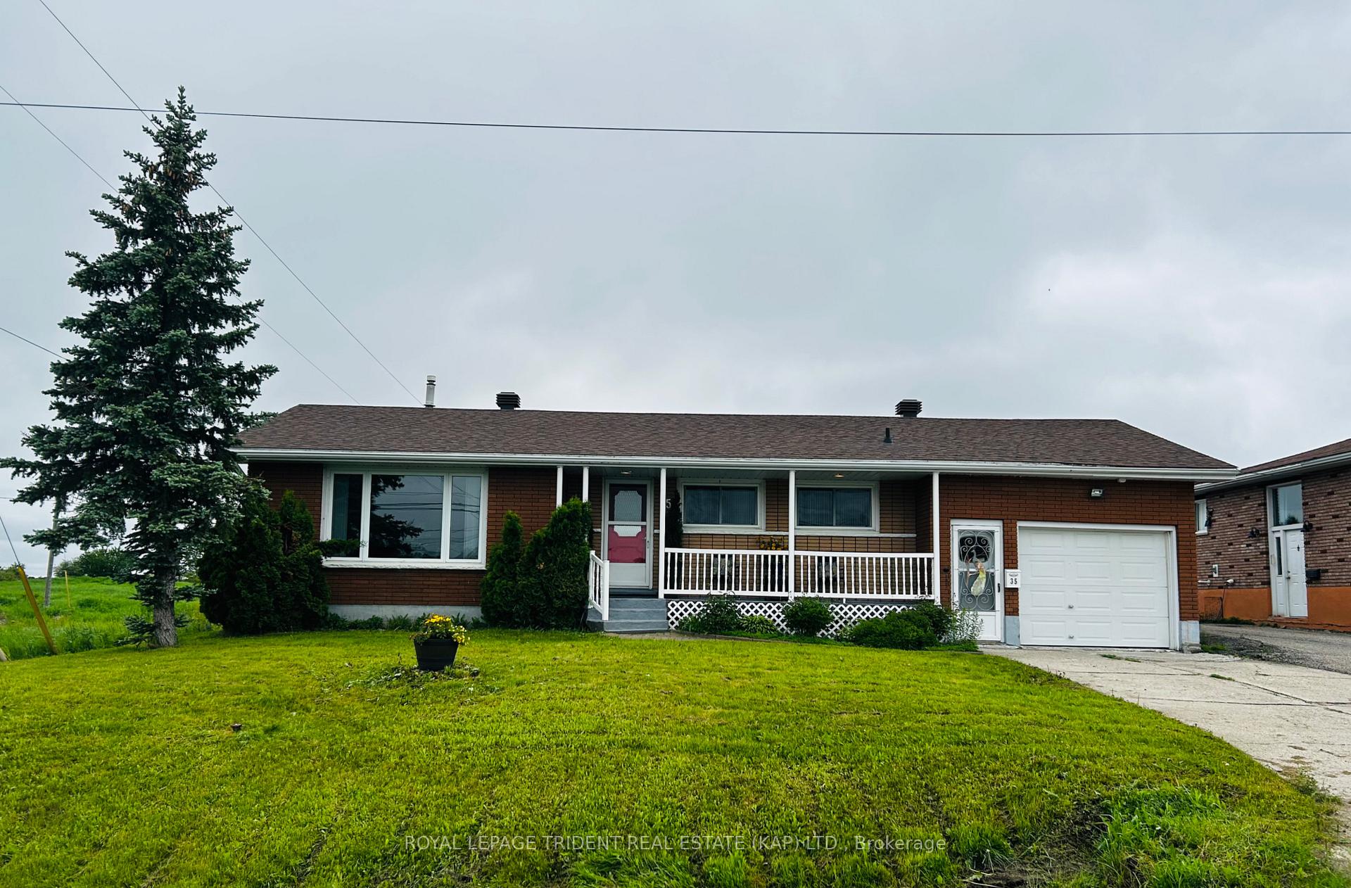 Photo 1 of 35 Brunelle Road S, Kapuskasing — HOMEH