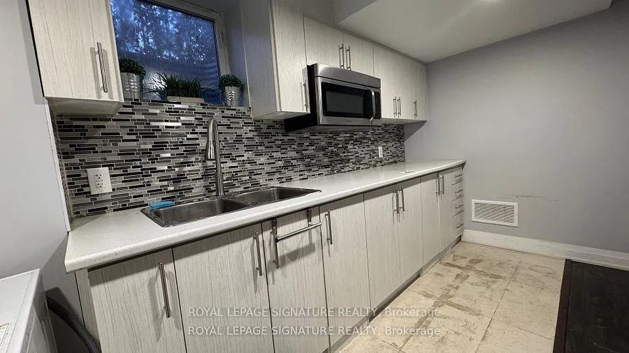 Photo 3 of Unit Bsmt, 731 Bennett Boulevard, Milton, Beaty — HOMEH