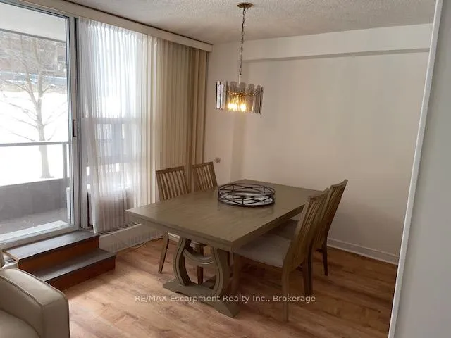 Photo 4 of Unit 103, 1964 Main Street W, Hamilton, Ainslie Wood — HOMEH