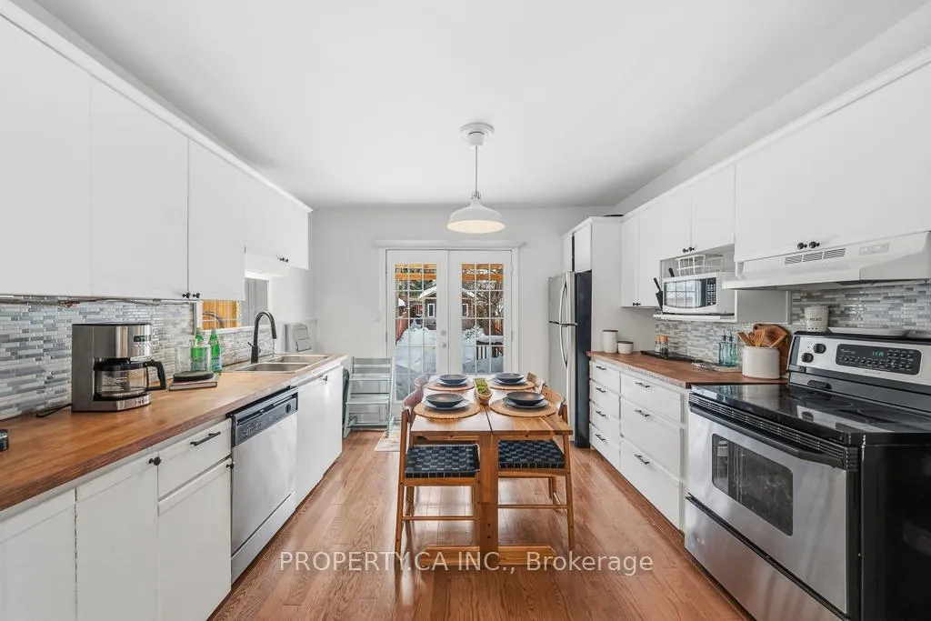 Photo 12 of 146 King Edward Avenue, Toronto, Woodbine-Lumsden — HOMEH