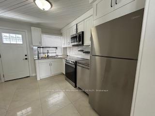 Photo 7 of Unit Main Fl, 12894 Keele Street, King, King City — HOMEH