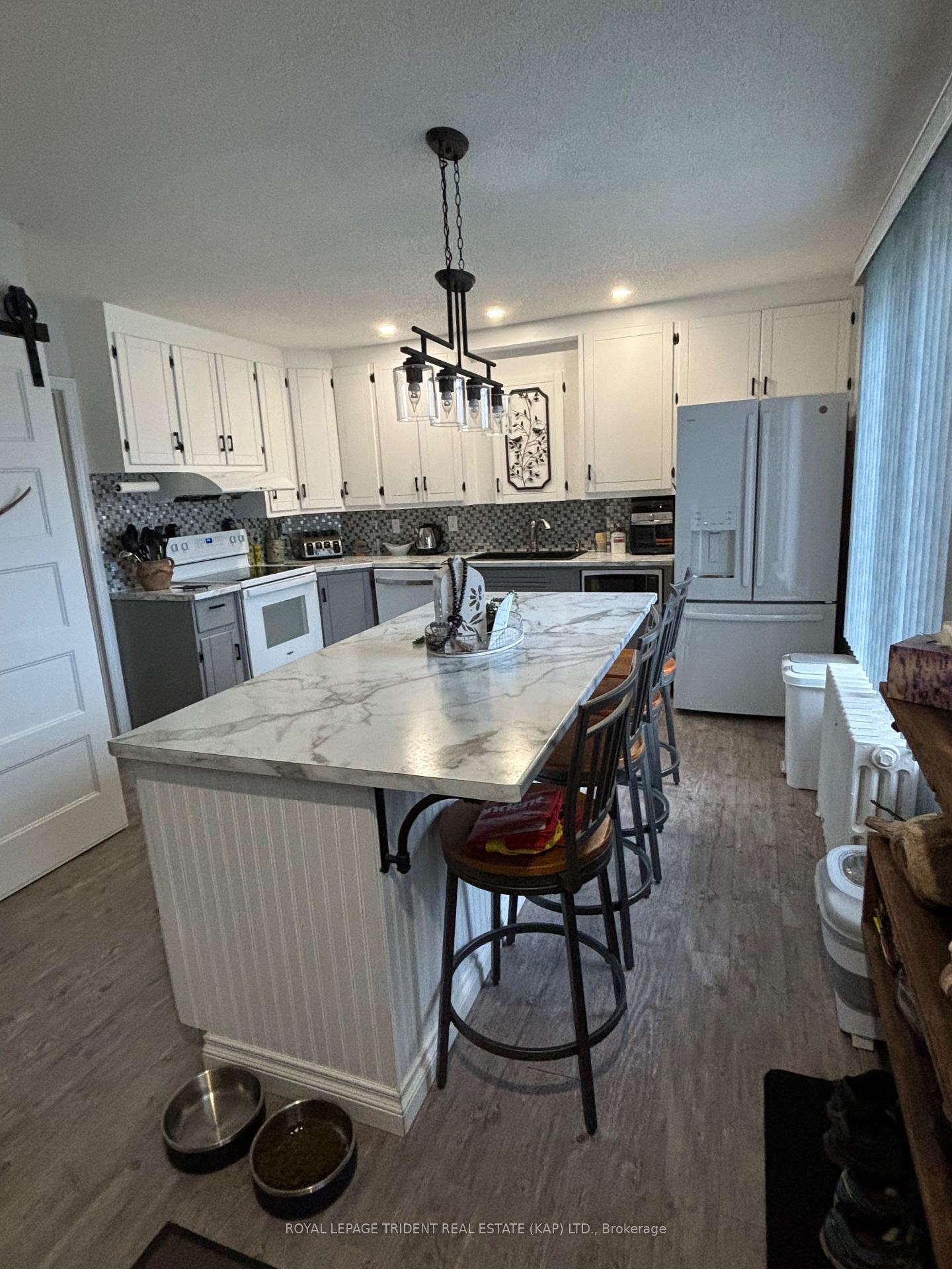 Photo 2 of 32 Riverside Drive, Kapuskasing — HOMEH