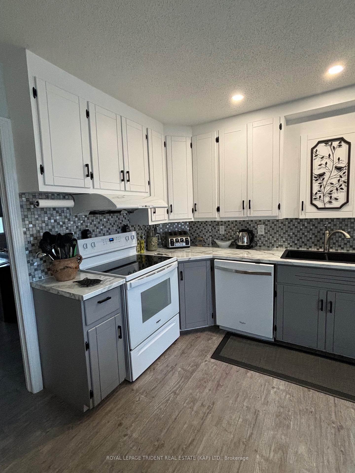 Photo 3 of 32 Riverside Drive, Kapuskasing — HOMEH