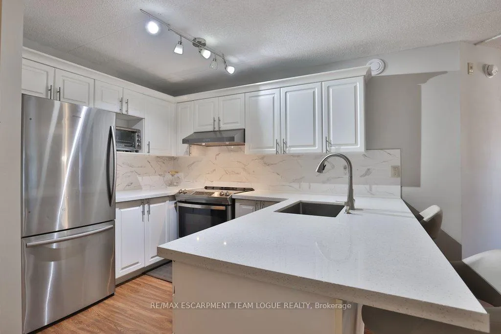 Photo 6 of Unit 211, 2010 Cleaver Avenue, Burlington, Headon — HOMEH