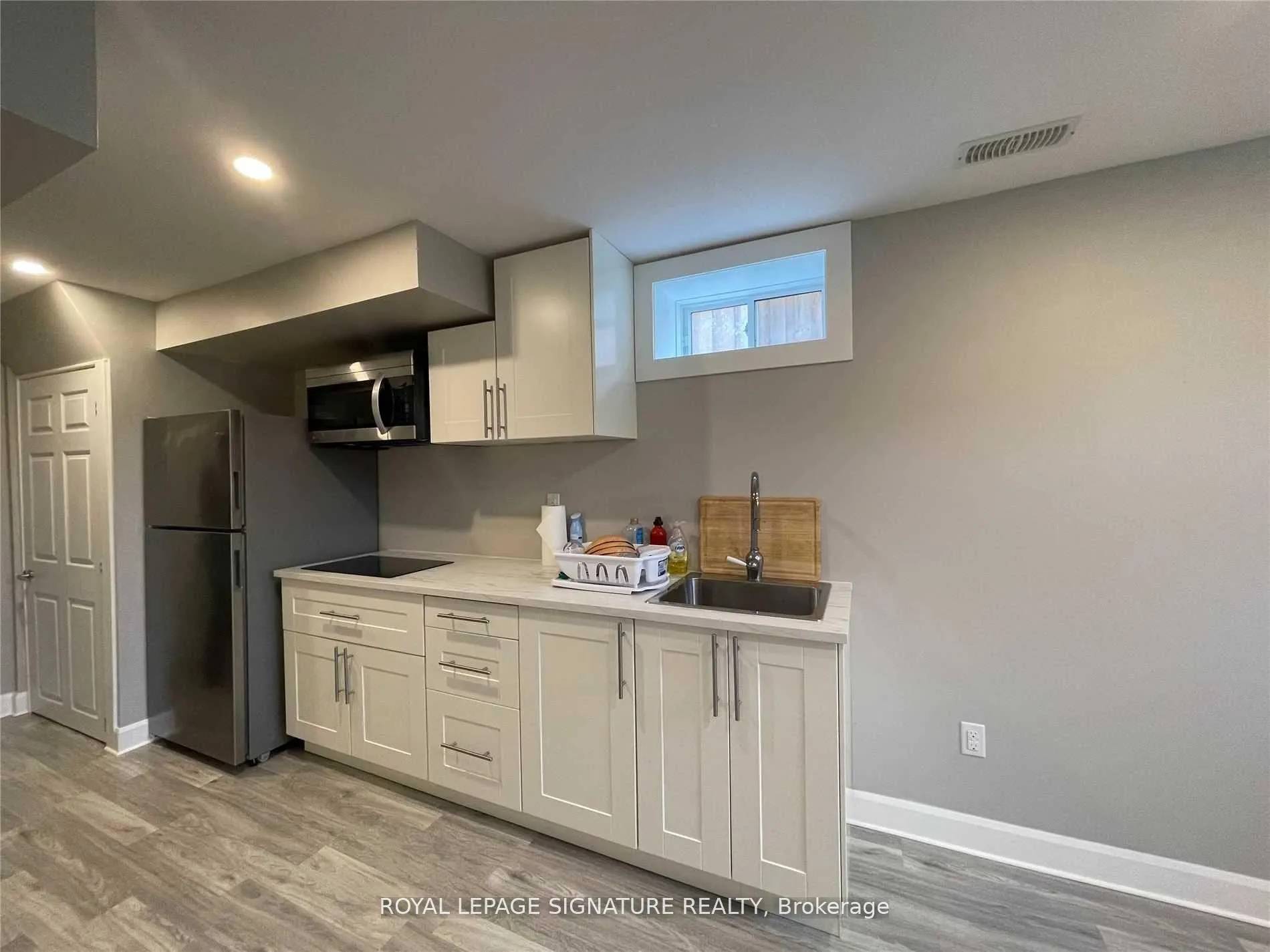 Photo 2 of Unit Bsmt, 174 Wagner Crescent, Essa, Angus — HOMEH