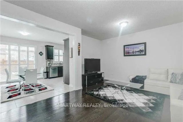 Photo 5 of 52 Franktown Drive, Brampton, Bram East — HOMEH