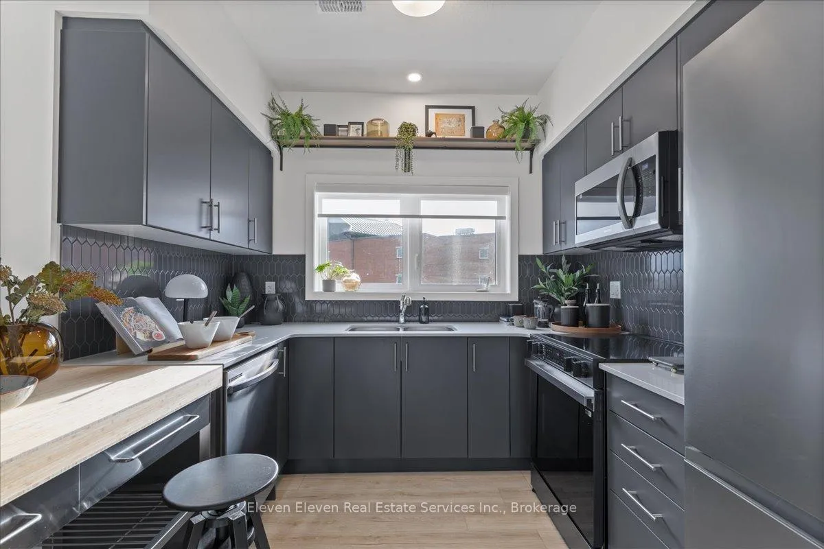 Photo 11 of Unit 18, 42 Lowes Road, Guelph, Clairfields/Hanlon Business Park — HOMEH