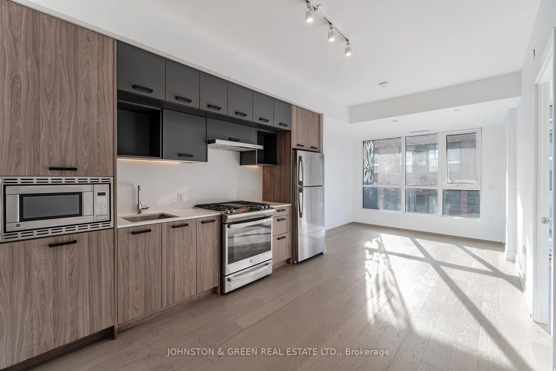 Photo 5 of Unit 411, 1331 Queen Street E, Toronto, Greenwood-Coxwell — HOMEH