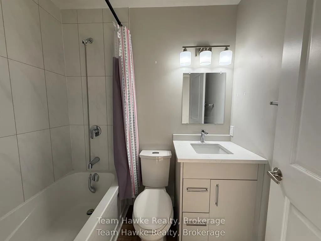 Photo 5 of Unit 5B, 521 Bay Street, Midland — HOMEH