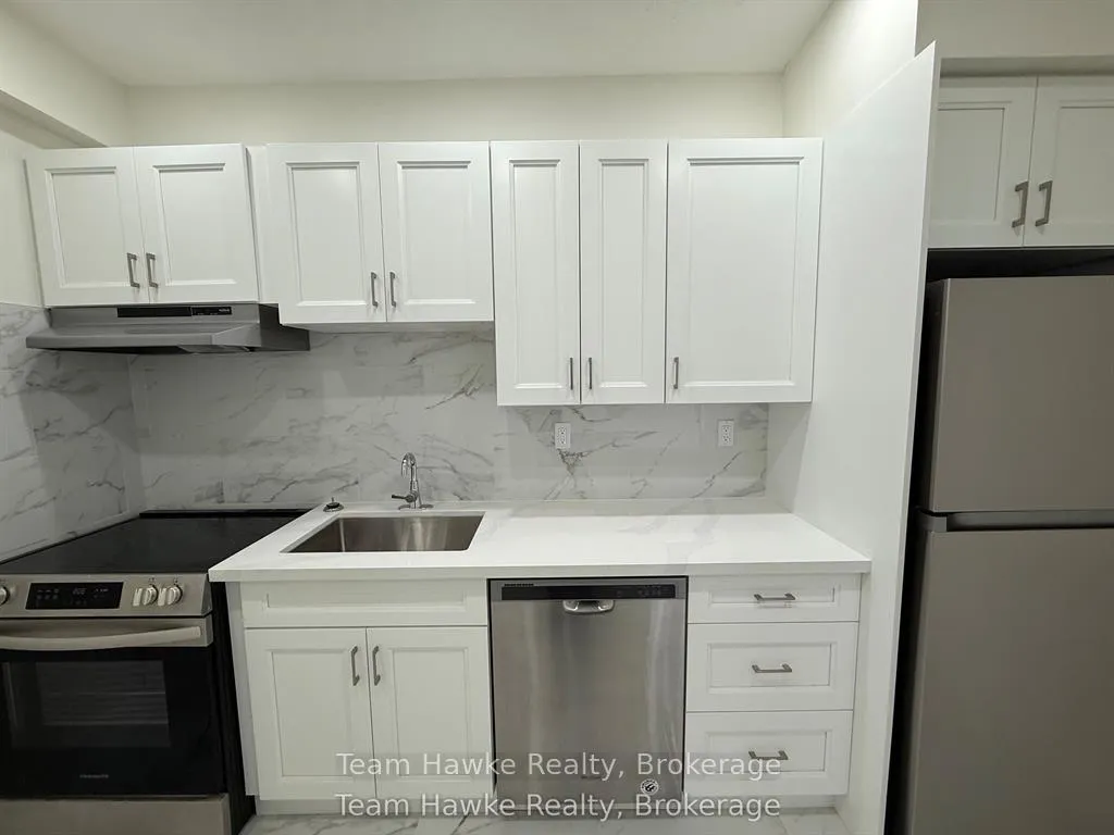 Photo 3 of Unit 13, 521 Bay Street, Midland — HOMEH