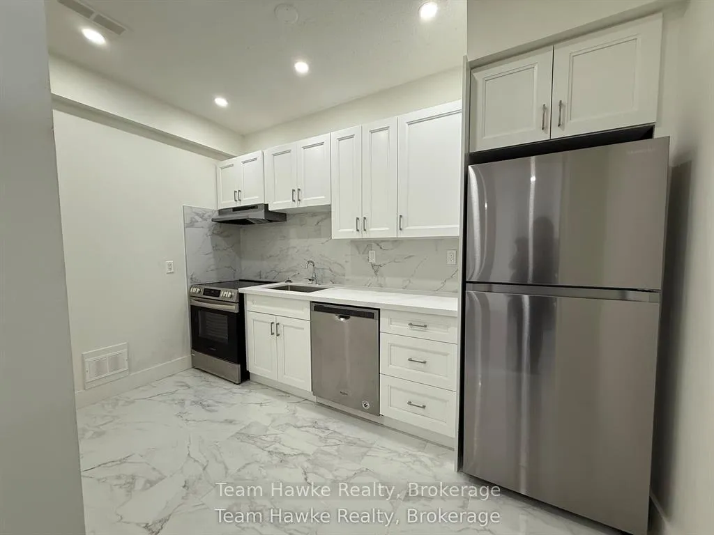 Photo 4 of Unit 13, 521 Bay Street, Midland — HOMEH