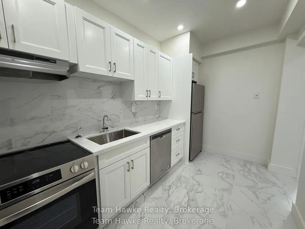 Photo 5 of Unit 13, 521 Bay Street, Midland — HOMEH