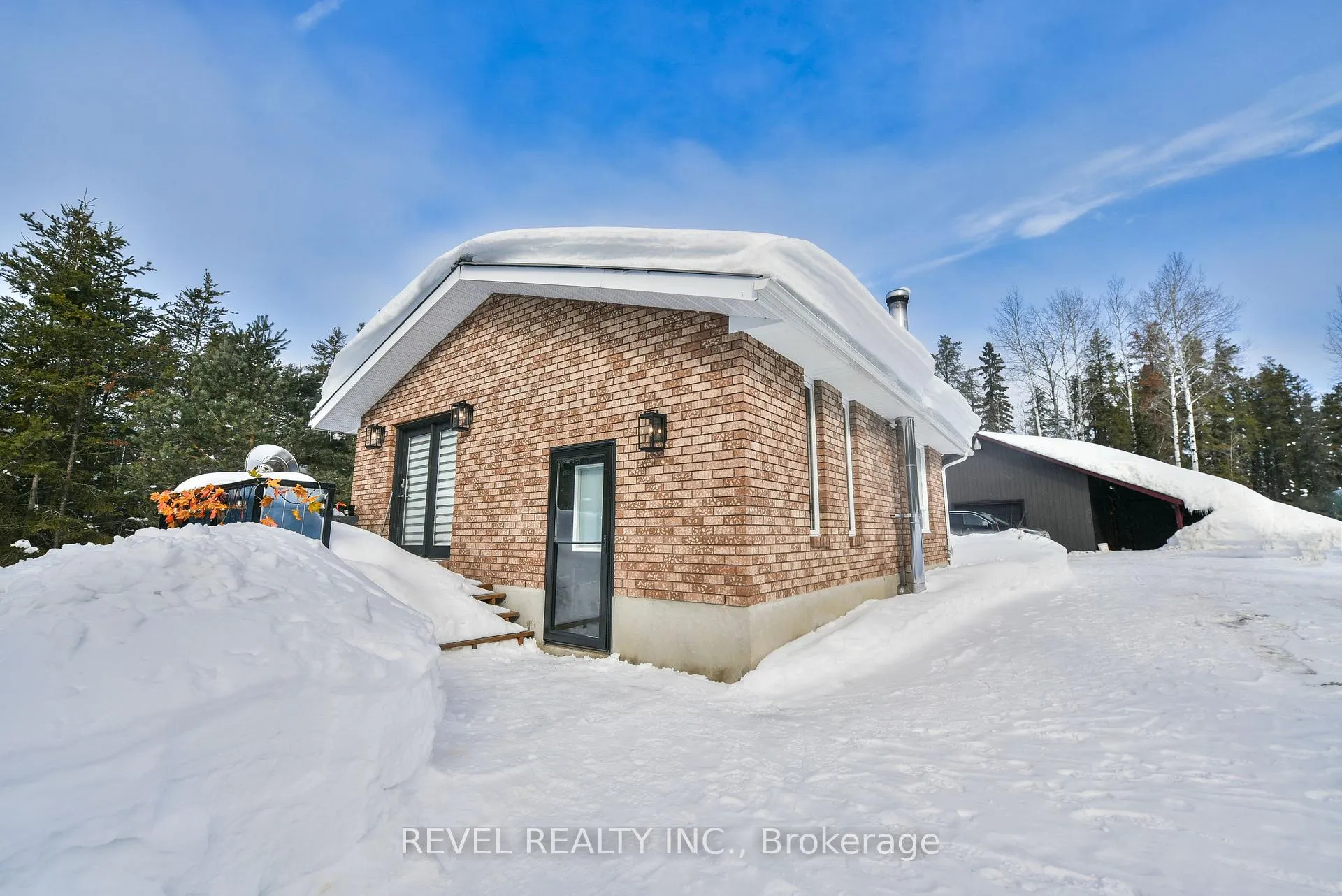 Photo 2 of 978 Municipal Road, Timmins, TM - Outside East — HOMEH