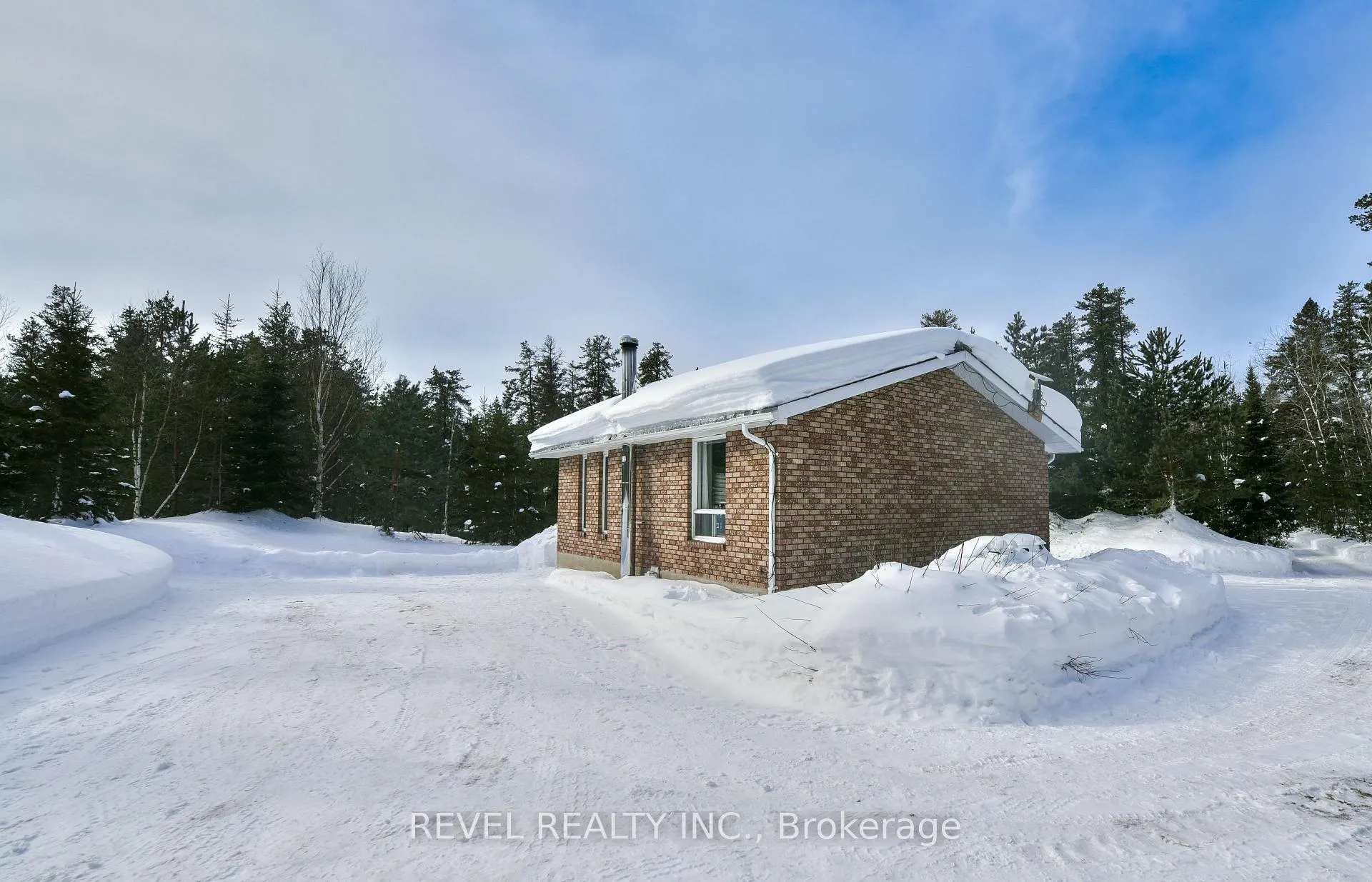 Photo 3 of 978 Municipal Road, Timmins, TM - Outside East — HOMEH