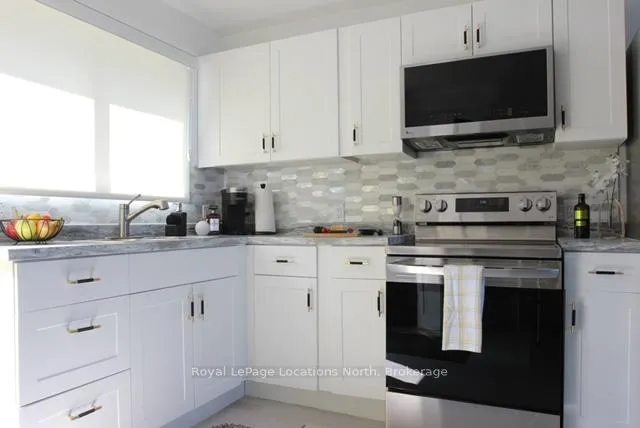 Photo 10 of Unit Unit 14, 209513 Highway 26, Blue Mountains — HOMEH