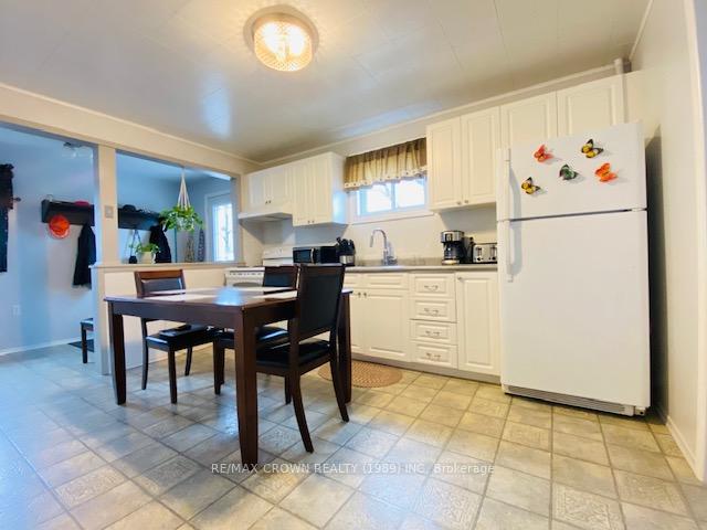 Photo 11 of 21 Wolfe Street, Kapuskasing — HOMEH