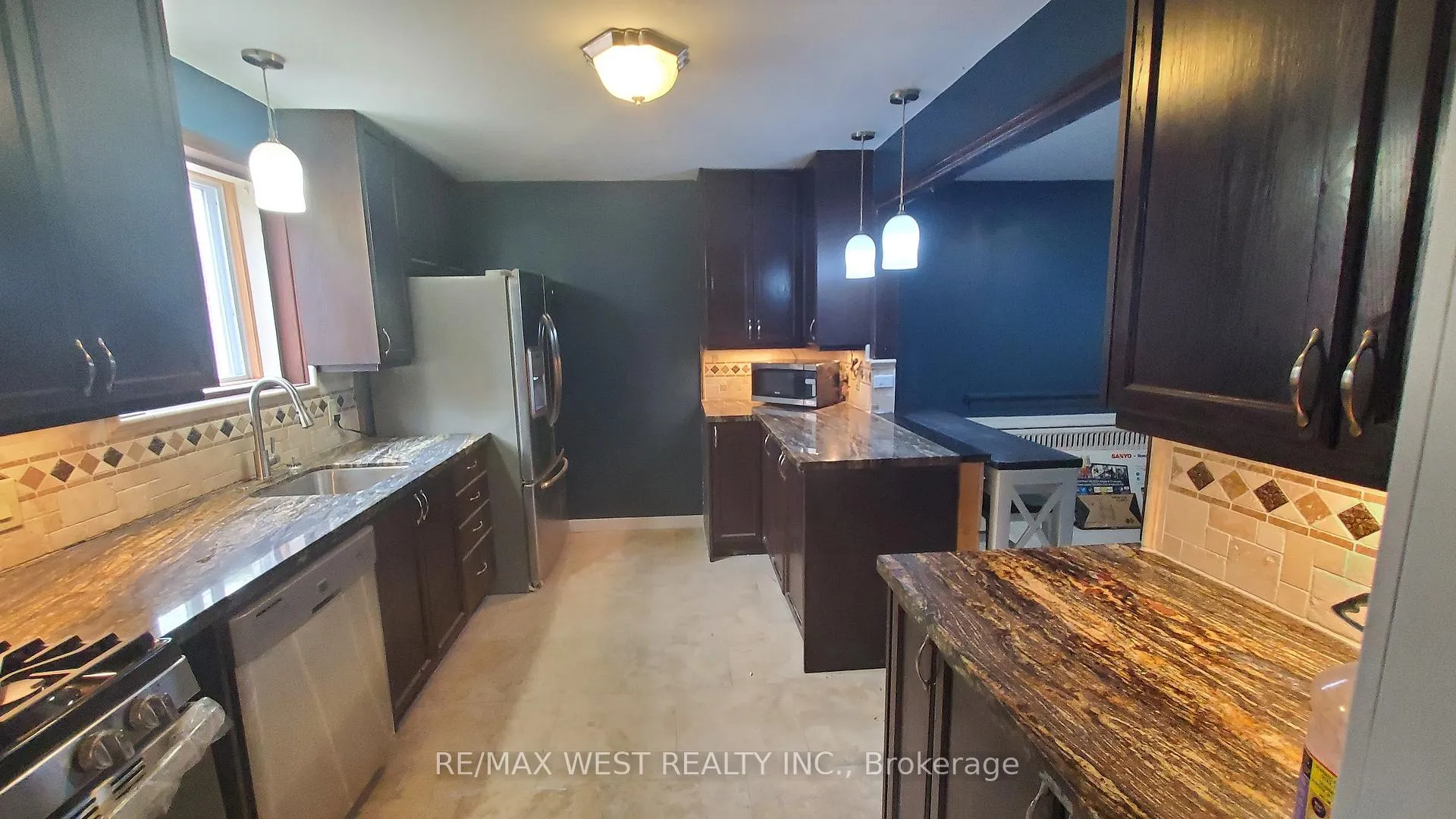 Photo 4 of Unit Main, 135 Ellins Avenue, Toronto, Rockcliffe-Smythe — HOMEH