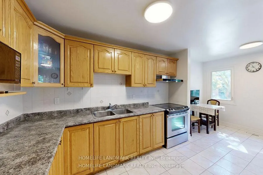 Photo 10 of 32 Coatsworth Crescent, Toronto, Woodbine Corridor — HOMEH