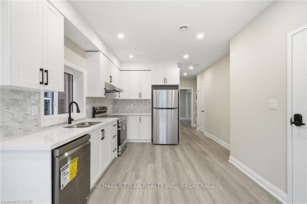 Photo 1 of Unit 2, 489 Cannon Street E, Hamilton, Gibson — HOMEH