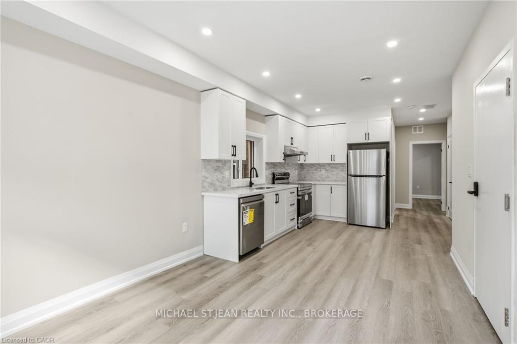 Photo 3 of Unit 2, 489 Cannon Street E, Hamilton, Gibson — HOMEH