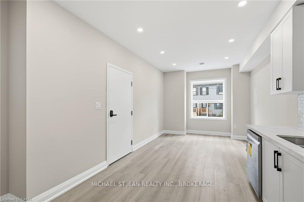 Photo 4 of Unit 2, 489 Cannon Street E, Hamilton, Gibson — HOMEH