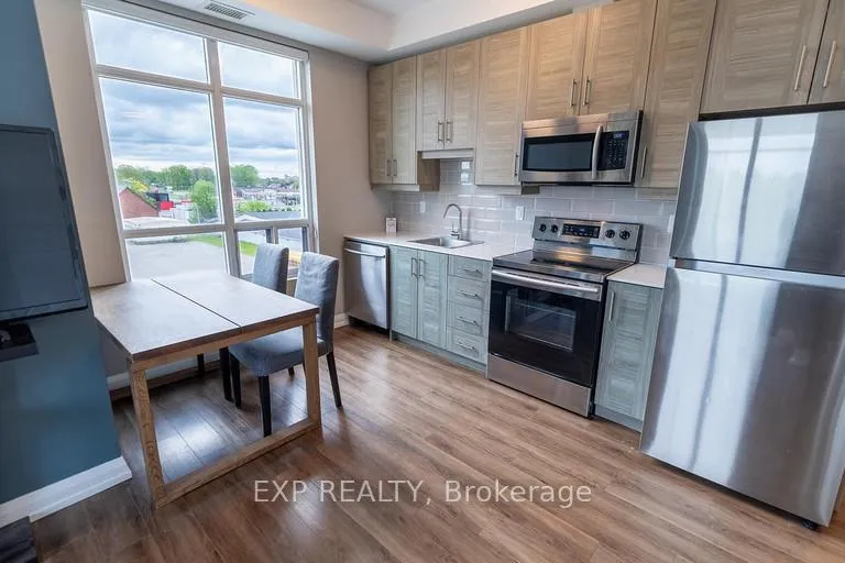 Photo 3 of Unit 402, 6289 Mcleod Road, Niagara Falls, Arad/Fallsview — HOMEH