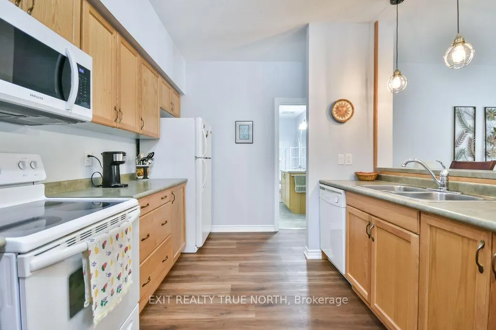 Photo 5 of Unit 107, 19B Yonge Street N, Springwater, Elmvale — HOMEH
