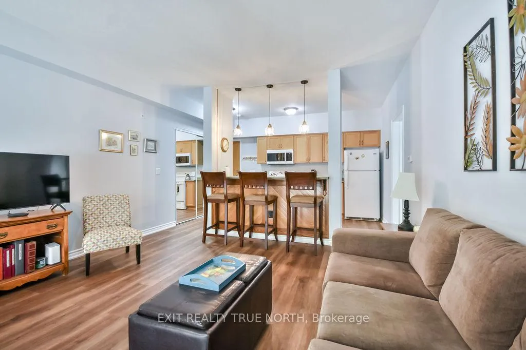 Photo 12 of Unit 107, 19B Yonge Street N, Springwater, Elmvale — HOMEH