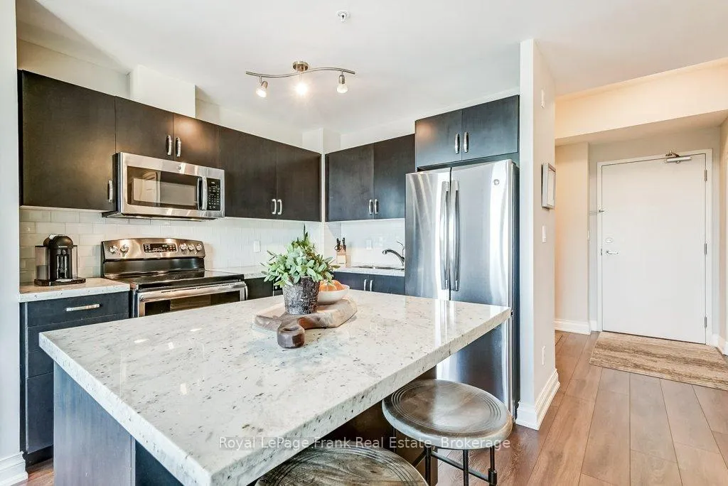Photo 11 of Unit 609, 68 Main Street N, Markham, Old Markham Village — HOMEH