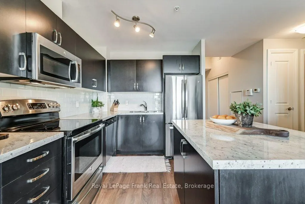 Photo 13 of Unit 609, 68 Main Street N, Markham, Old Markham Village — HOMEH