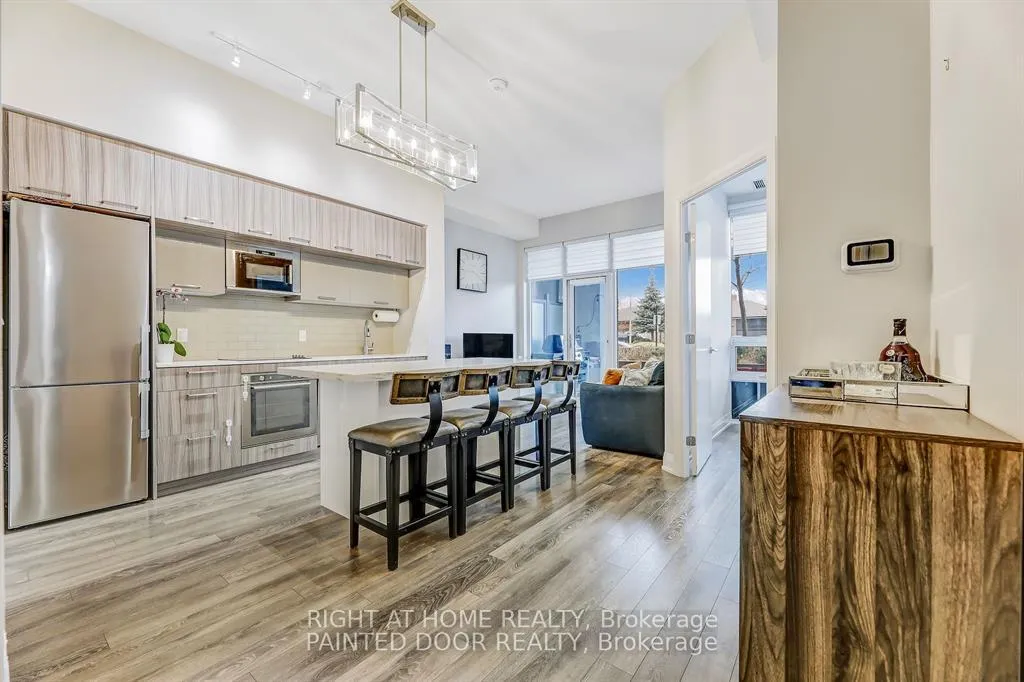 Photo 6 of Unit 101, 4800 Highway 7, Vaughan, East Woodbridge — HOMEH