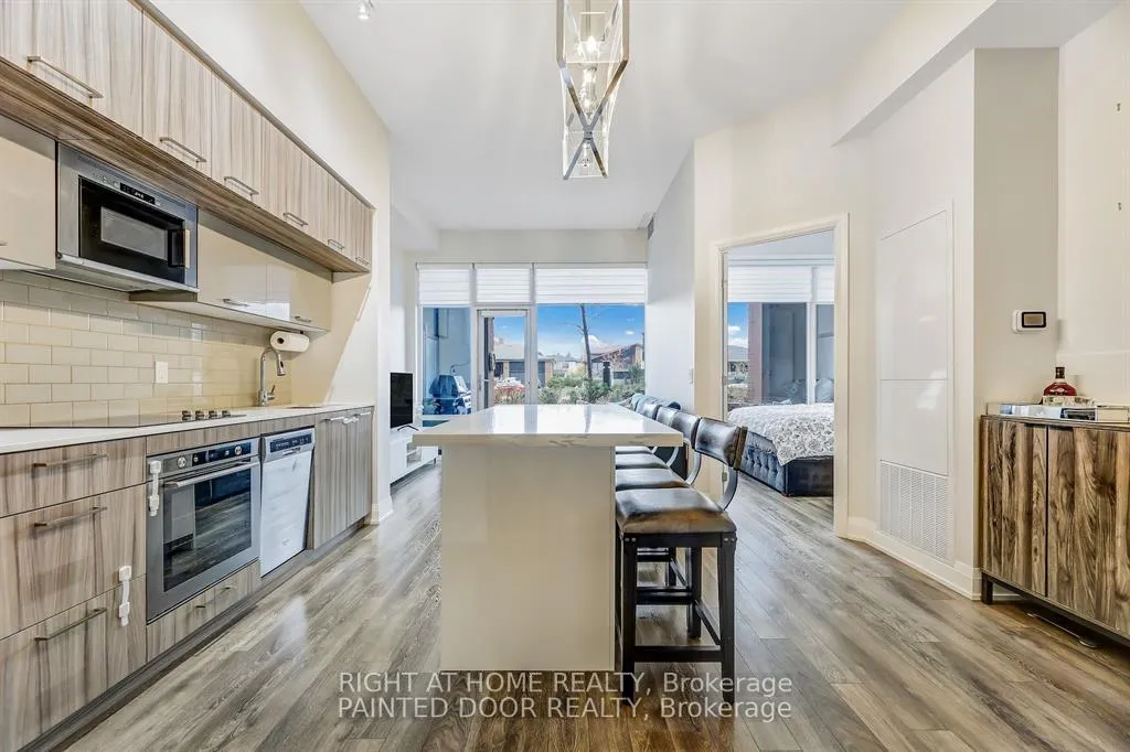 Photo 7 of Unit 101, 4800 Highway 7, Vaughan, East Woodbridge — HOMEH